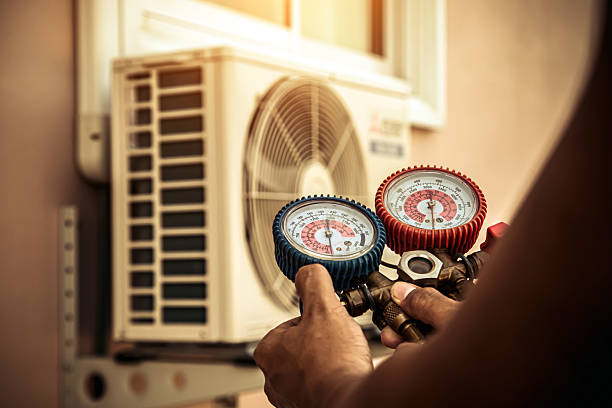 Professional Heat Pump Repair technician working in New Berlin, WI